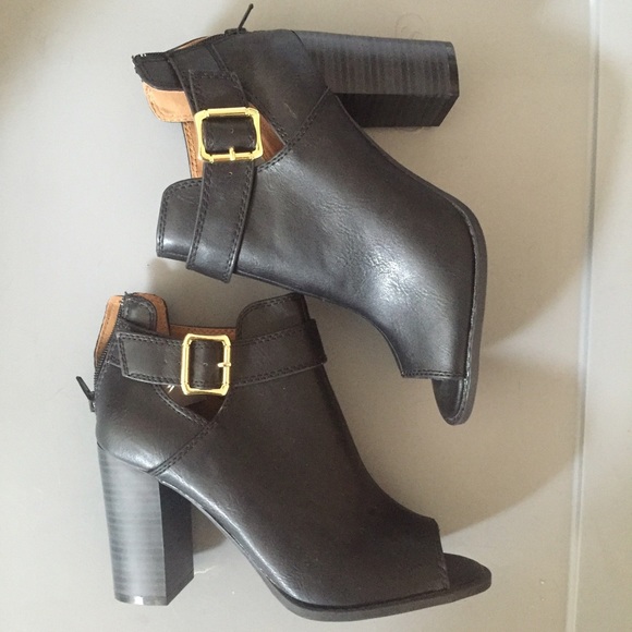 Black open toe bootie with gold buckle