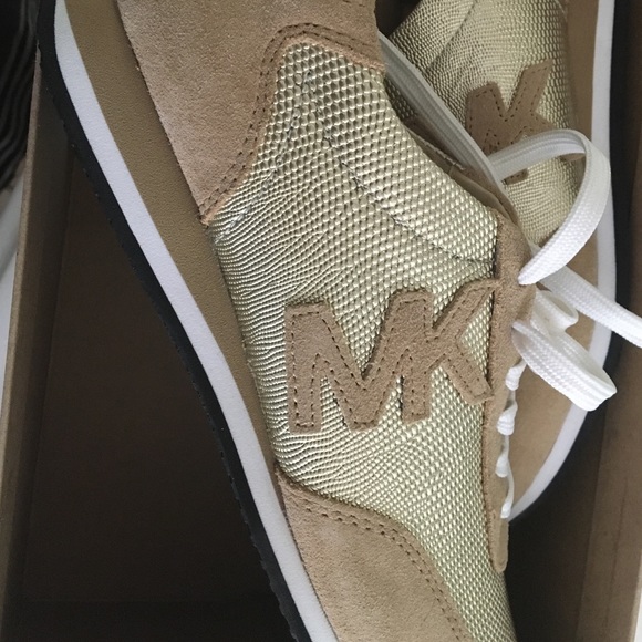 Michael Kors gold sneakers