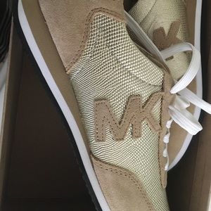 Michael Kors gold sneakers