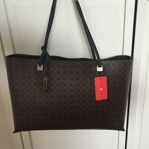 Ivanka Trump Julia handbag and cosmetic bag