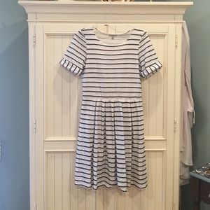 White and blue striped jersey dress.