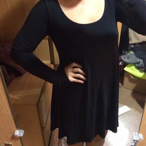 Long sleeved, black swing dress