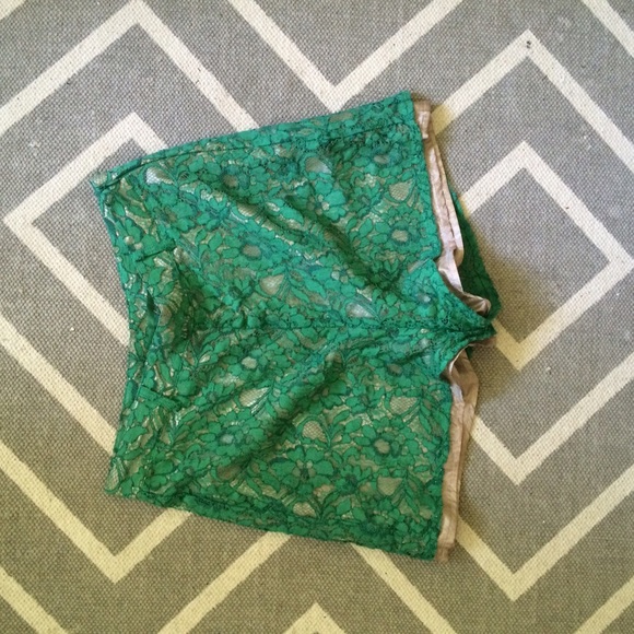 High waisted short shorts with green lace overlay - Picture 1 of 2