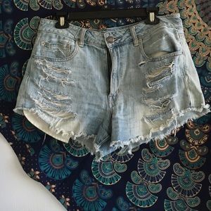 Distressed high rise festival shorts