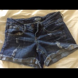 Distressed jean shorts