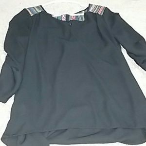 black blouse with Aztec