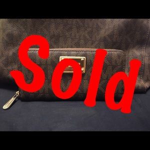 SOLD ! Michael Kors Signature Zip Around Wallet