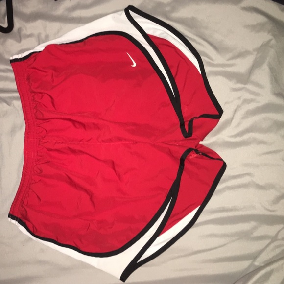 Red Nike shorts