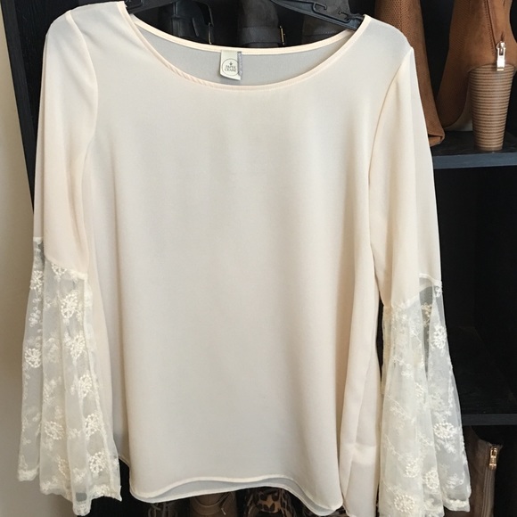 Blouse with bell sleeves