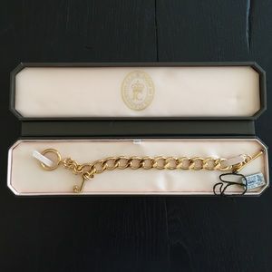 Brand new gold Juicy Couture bracelet