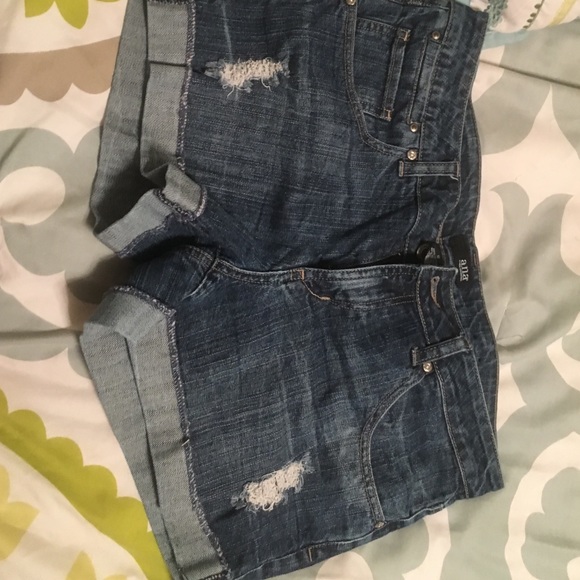 Denim jeans with slight distressing.