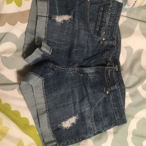 Denim jeans with slight distressing.