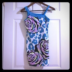 A set of a blue dress with glitter pants