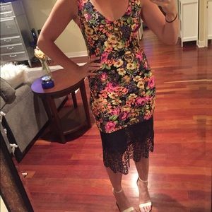 Floral cotton dress with lace trim along bottom