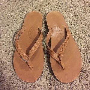 Rainbow braided strap flip flops