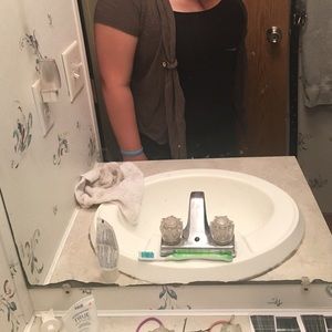 Maurice's brown sweater