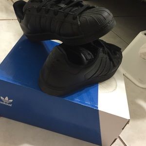 Black superstar shoes