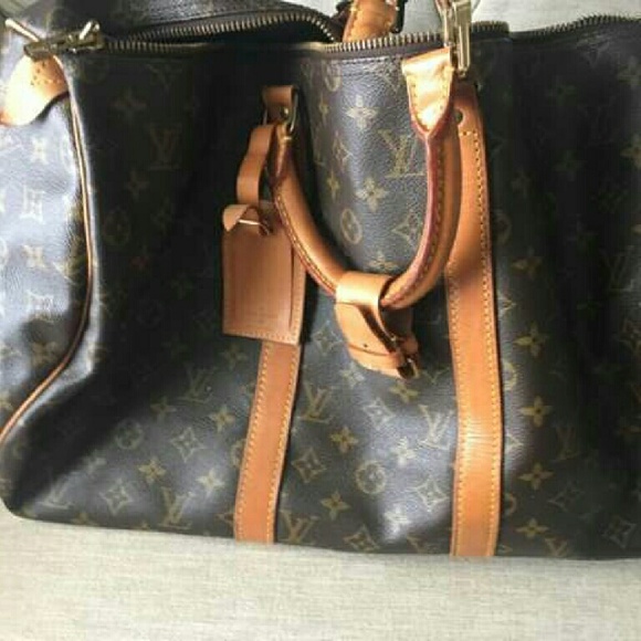 Do not by Authentic LV 55 keepall bandouliere