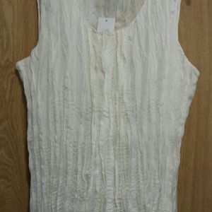 Beautiful 100% silk shell with silk lining.