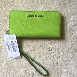Green Michael khors wristlet