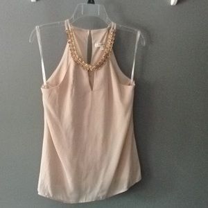 Embellished tank