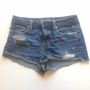 High rise distressed denim shorts