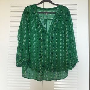 Sheer blouse with slight high-low cut