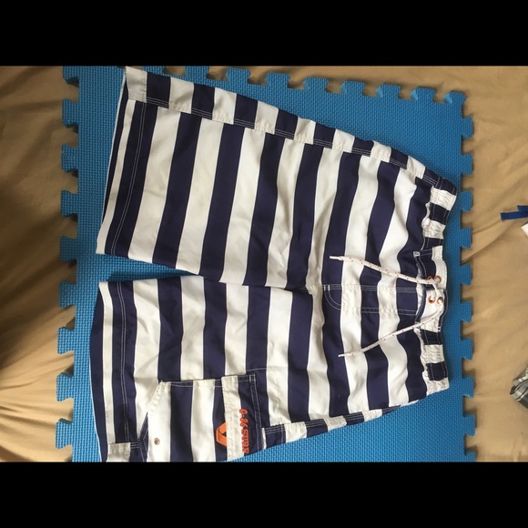 Blue and white striped bathing suit 🏊🏽