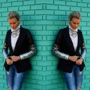 Black jacket w/sequined sleeves.