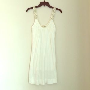 White ivory knit dress with strap embellishments