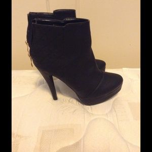 Black heeled boots- size 6.5