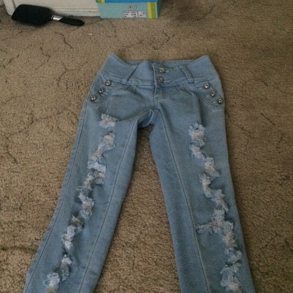 Light blue ripped jeans