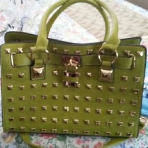 green bag with lockett attached