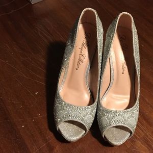 Silver Platform shoes.
