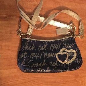 Navy and gold Coach purse