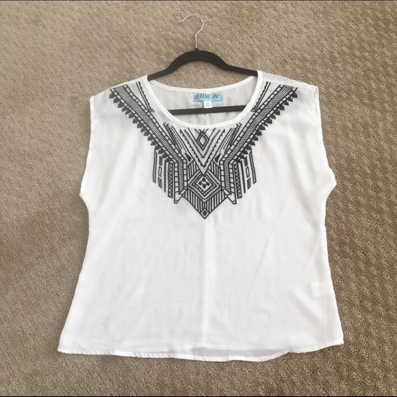 white top with black pattern