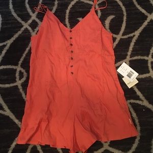 Super cute BRAND NEW orange romper