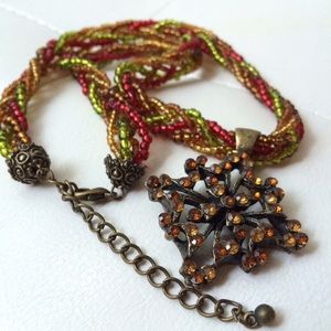 Unique antique pendant on multi strand necklace