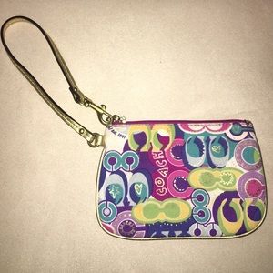 small Coach wristlet.