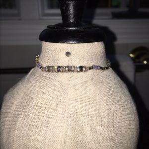 Purple, rhinestone, and gold beaded bracelet