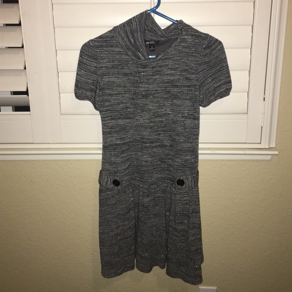 A grey, glittery dress.