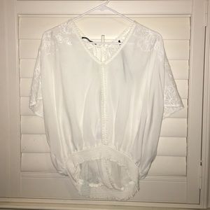 A loose cut out shirt