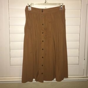 A khaki colored mid skirt