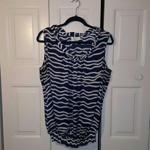 Navy and white sleeveless blouse