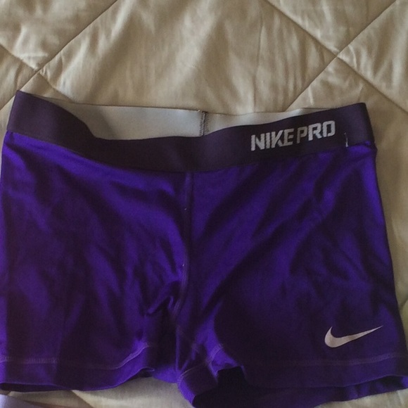 Solid dark purple Nike pros