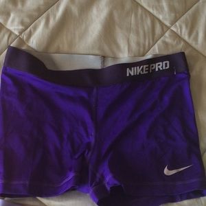 Solid dark purple Nike pros