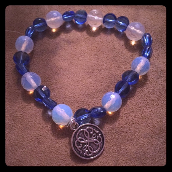 Opalite and blue beads with a path of life charm