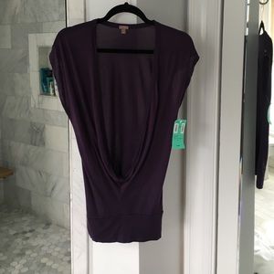 Deep v neck tee.  Would be cute with a tank top.