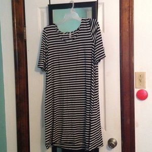 Super cute tee shirt dress has pockets on the side