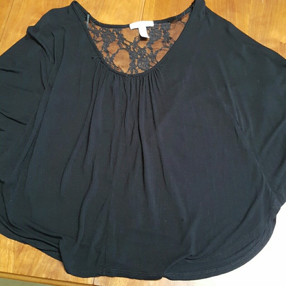 Cape sleeved blouse.
